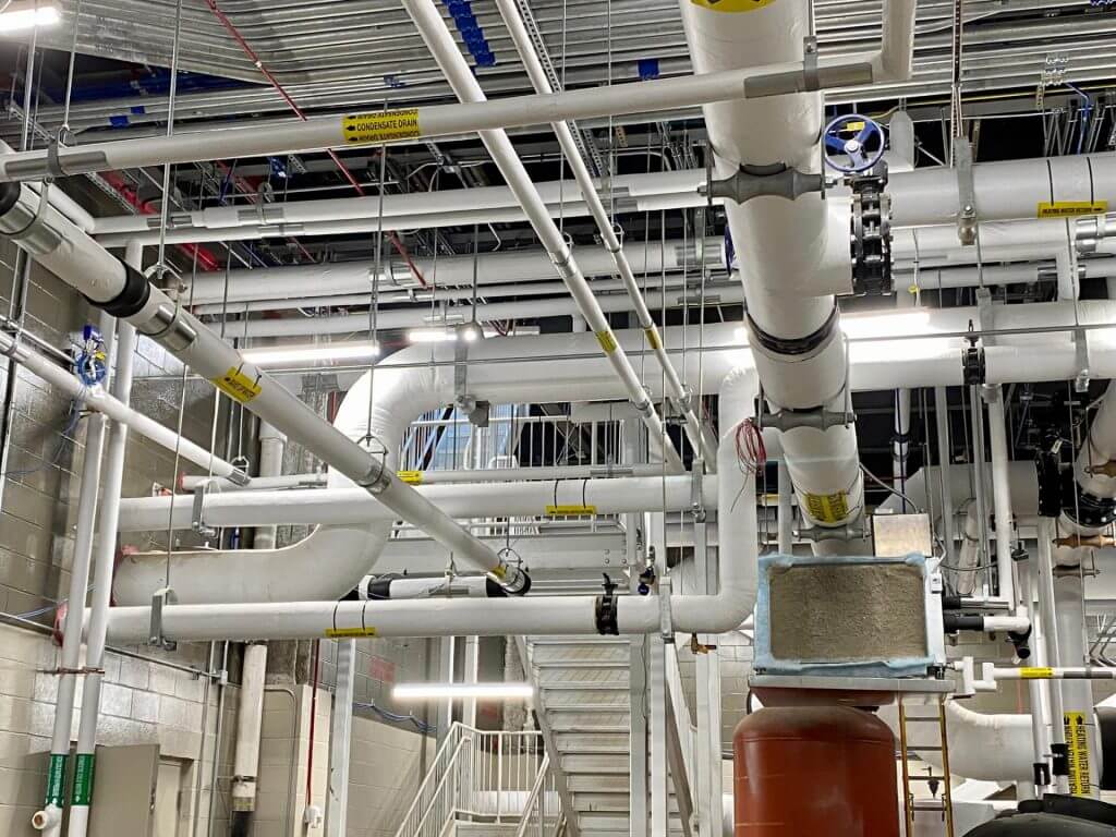 Freshly installed tubes in an industrial space
